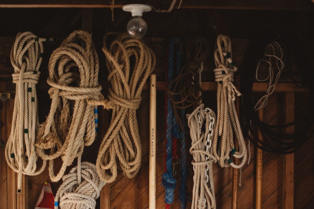 Assortment of ropes hanging on a rack